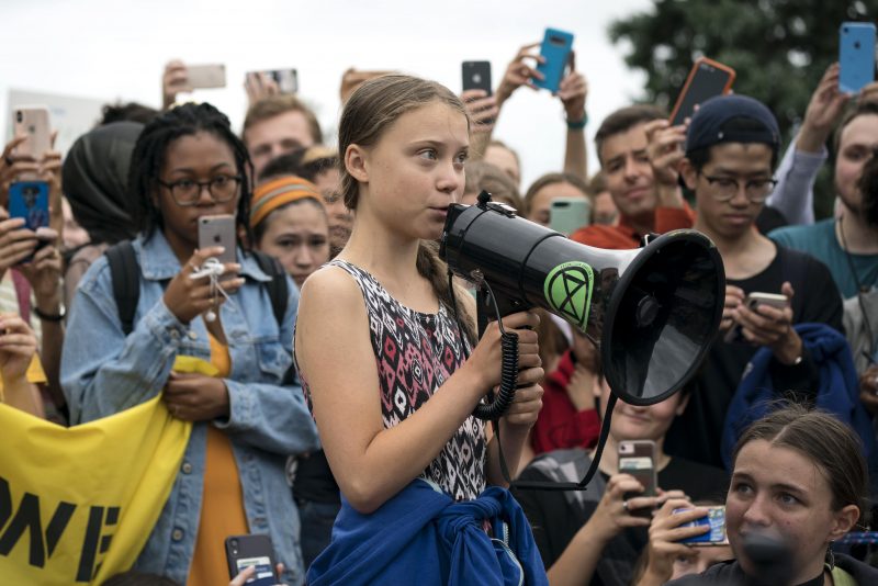 WASHINGTON, DC - SEPTEMBER 13: Teenage Swedish climate activist Greta Thunberg delivers brief remarks surrounded by other student environmental advocates during a strike to demand action be taken on climate change outside the White House on September 13, 2019 in Washington, DC. The strike is part of Thunberg's six day visit to Washington ahead of the Global Climate Strike scheduled for September 20. (Photo by Sarah Silbiger/Getty Images)