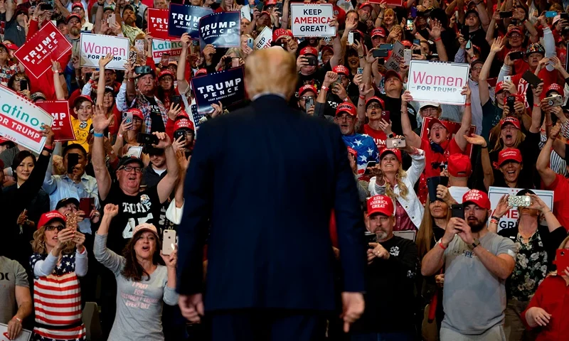 TOPSHOT-US-politics-Trump-election TOPSHOT - Supporters cheer as US President Donald Trump arrives to deliver remarks at a Keep America Great rally in Las Vegas, Nevada, on February 21, 2020. (Photo by JIM WATSON / AFP) (Photo by JIM WATSON/AFP via Getty Images)