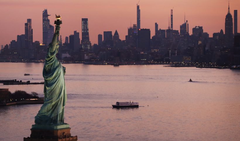 NEW YORK, NEW YORK - MARCH 18: Dawn breaks over The Statue of Liberty as Manhattan and the nation struggles to contain the number of coronavirus cases on March 18, 2020 in New York City. Across the city businesses, schools and places of work have been shutting down leading to empty streets and quiet neighborhoods. New York City mayor Bill de Blasio has threatened to call for a 'shelter-in-place' order as Manhattan continues to see a rise in cases of the virus. World wide, 200,000 people have now contracted COVID-19. (Photo by Spencer Platt/Getty Images)