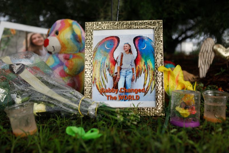 NORTH PORT, FLORIDA - SEPTEMBER 21: A makeshift memorial dedicated to Gabby Petito is located near the North Port City Hall on September 21, 2021 in North Port, Florida. The body of Petito was found by authorities in Wyoming, where she went missing while on a cross-country trip with her fiance, Brian Laundrie. Law enforcement agencies are for searching for his whereabouts. (Photo by Octavio Jones/Getty Images)