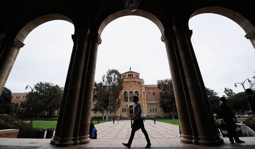 LOS ANGELES, CA - APRIL 23: A student walks near Royce Hall on the campus of UCLA on April 23, 2012 in Los Angeles, California. According to reports, half of recent college graduates with bachelor's degrees are finding themselves underemployed or jobless. (Photo by Kevork Djansezian/Getty Images)