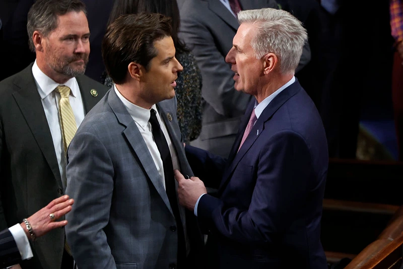 WASHINGTON, DC - JANUARY 06: U.S. House Republican Leader Kevin McCarthy (R-CA) (L) talks to Rep.-elect Matt Gaetz (R-FL) in the House Chamber after Gaetz voted present during the fourth day of voting for Speaker of the House at the U.S. Capitol Building on January 06, 2023 in Washington, DC. The House of Representatives is meeting to vote for the next Speaker after House Republican Leader Kevin McCarthy (R-CA) failed to earn more than 218 votes on several ballots; the first time in 100 years that the Speaker was not elected on the first ballot. (Photo by Chip Somodevilla/Getty Images)