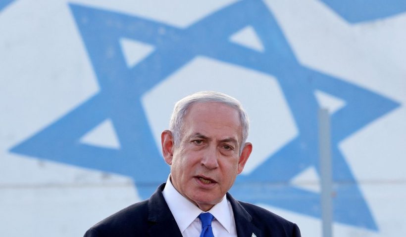 TOPSHOT - Israel's Prime Minister Benjamin Netanyahu delivers a speech during his visit to an Israeli unmanned aerial vehicle (UAV) centre, at the Palmachim Airbase near the city of Rishon LeZion on July 5, 2023. (Photo by JACK GUEZ / AFP) (Photo by JACK GUEZ/AFP via Getty Images)