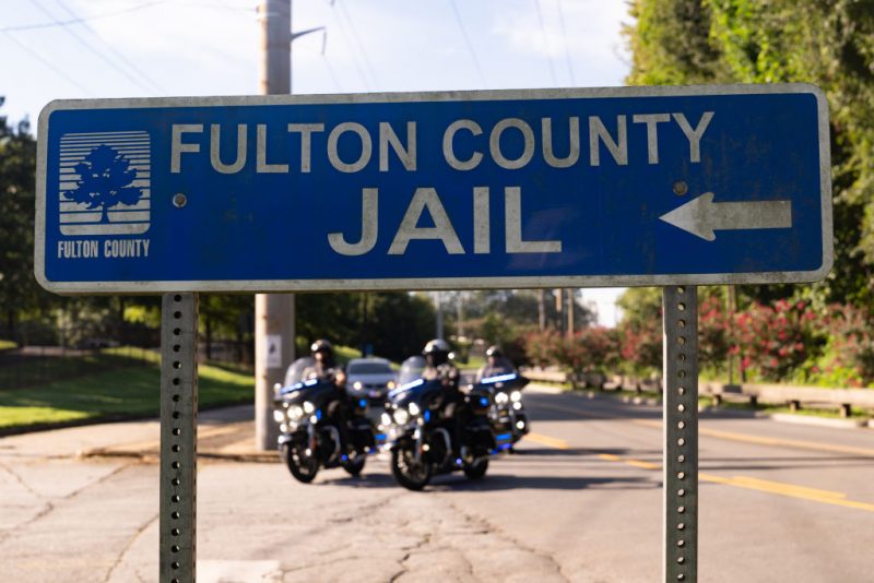 ATLANTA, GEORGIA - AUGUST 16: A sign is posted outside of the Fulton County Jail on August 16, 2023 in Atlanta, Georgia. Former President Donald Trump and 18 others facing felony charges in the indictment related to tampering with the 2020 election in Georgia have been ordered to turn themselves in by August 25. (Photo by Megan Varner/Getty Images)