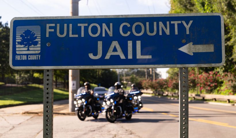 ATLANTA, GEORGIA - AUGUST 16: A sign is posted outside of the Fulton County Jail on August 16, 2023 in Atlanta, Georgia. Former President Donald Trump and 18 others facing felony charges in the indictment related to tampering with the 2020 election in Georgia have been ordered to turn themselves in by August 25. (Photo by Megan Varner/Getty Images)