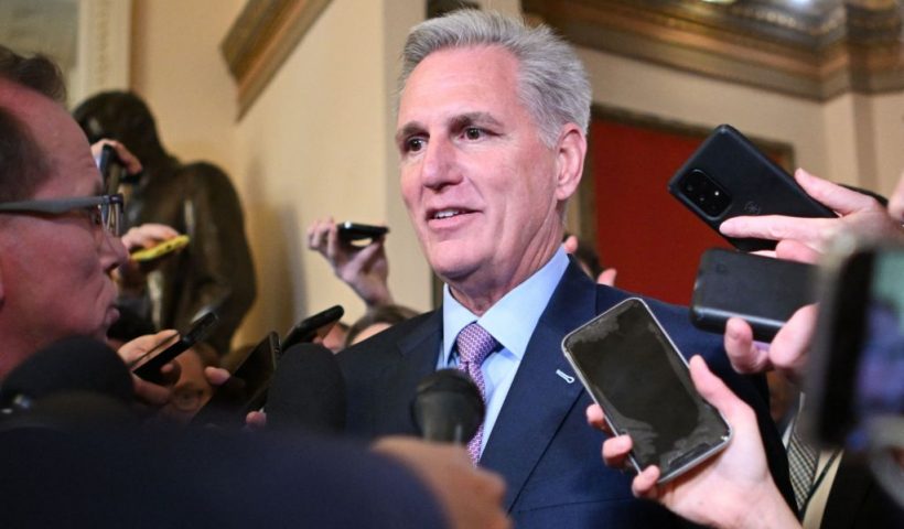 Speaker of the House Kevin McCarthy, Republican of California, talks to reporters, outside his office at the US Capitol in Washington, DC on October 3, 2023. McCarthy was fighting for his political life ahead of a vote expected Tuesday on whether to remove him as House speaker, forced by far-right critics angered by his work with Democrats. McCarthy sparked fury among the ultra-conservative wing of the party when he passed a bipartisan stopgap funding measure backed by the White House to avert a government shutdown on September 30, 2023. (Photo by Mandel NGAN / AFP) (Photo by MANDEL NGAN/AFP via Getty Images)