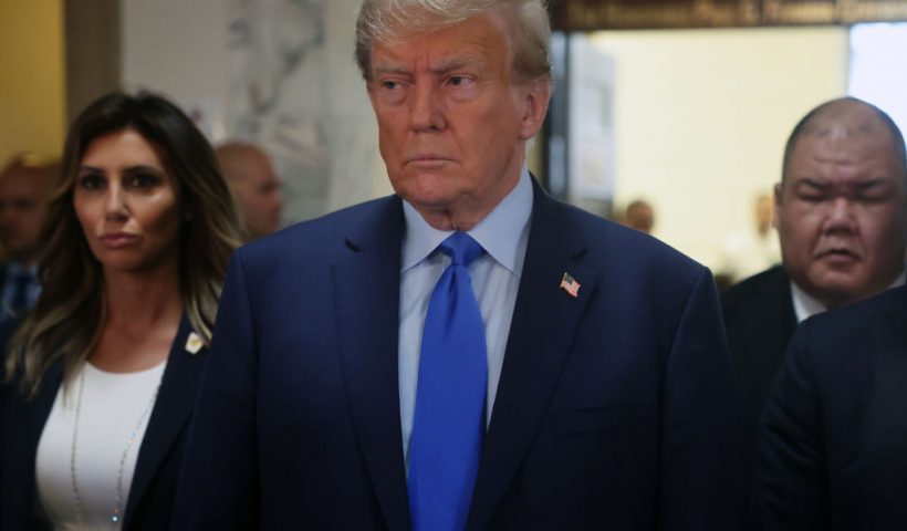 NEW YORK, NEW YORK - OCTOBER 02: Former President Donald Trump speaks to the media as he arrives at New York State Supreme Court to start the civil fraud trial against him on October 02, 2023 in New York City. Former President Trump may be forced to sell off his properties after Justice Arthur Engoron canceled his business certificates and ruled that he committed fraud for years while building his real estate empire after being sued by Attorney General Letitia James, seeking $250 million in damages. The trial will determine how much he and his companies will be penalized for the fraud. (Photo by Spencer Platt/Getty Images)