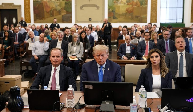 NEW YORK, NEW YORK - OCTOBER 02: Former U.S. President Donald Trump (C) attends the start of his civil fraud trial at New York State Supreme Court on October 02, 2023 in New York City. Former President Trump may be forced to sell off his properties after Justice Arthur Engoron canceled his business certificates and ruled that he committed fraud for years while building his real estate empire after being sued by Attorney General Letitia James, who is seeking $250 million in damages. The trial will determine how much he and his companies will be penalized for the fraud. (Photo by Seth Wenig-Pool/Getty Images)