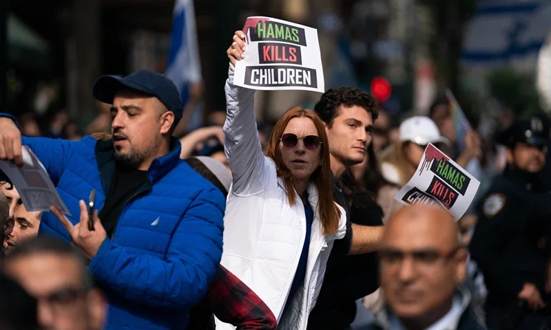 Demonstrators in support of Israel rally near the Consulate General of Israel in New York City on October 9, 2023. Palestinian militant group Hamas, which dragged off about 150 hostages in its surprise weekend assault on southern Israel, threatened on Monday to kill them if Israeli air strikes continue "targeting" Gaza residents without warning. (Photo by Adam GRAY / AFP) (Photo by ADAM GRAY/AFP via Getty Images)
