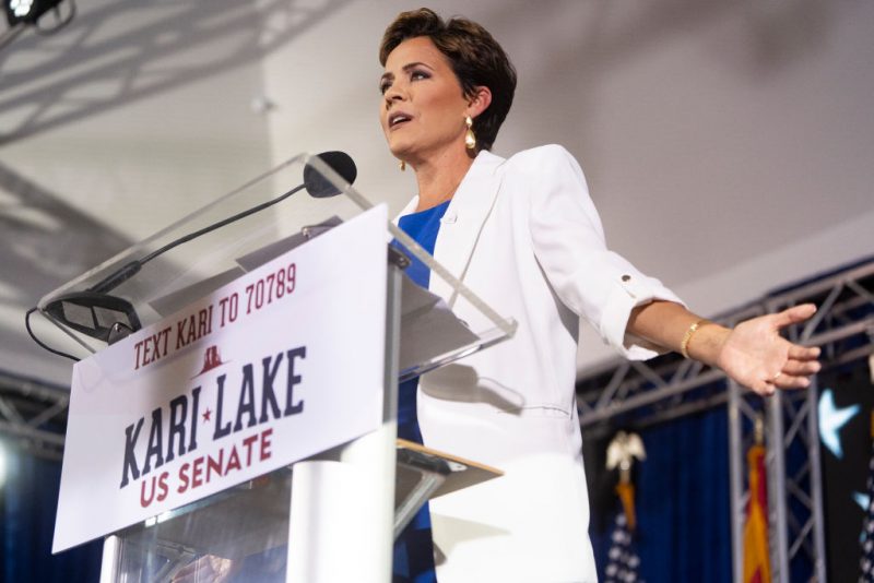 SCOTTSDALE, ARIZONA - OCTOBER 10: Former Arizona Republican gubernatorial candidate Kari Lake announces her bid for the seat of U.S. Sen. Kyrsten Sinema (I-AZ) at JetSet Magazine on October 10, 2023 in Scottsdale, Arizona. Former President Donald Trump gave his endorsement of Lake through a pre-recorded video during the rally. (Photo by Rebecca Noble/Getty Images)