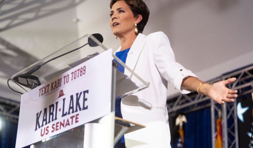 SCOTTSDALE, ARIZONA - OCTOBER 10: Former Arizona Republican gubernatorial candidate Kari Lake announces her bid for the seat of U.S. Sen. Kyrsten Sinema (I-AZ) at JetSet Magazine on October 10, 2023 in Scottsdale, Arizona. Former President Donald Trump gave his endorsement of Lake through a pre-recorded video during the rally. (Photo by Rebecca Noble/Getty Images)