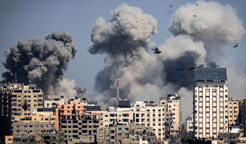 Smoke plumes billow during Israeli air strikes in Gaza City on October 12, 2023 as raging battles between Israel and the Hamas movement continue for the sixth consecutive day. Thousands of people, both Israeli and Palestinians have died since October 7, 2023, after Palestinian Hamas militants based in the Gaza Strip, entered southern Israel in a surprise attack leading Israel to declare war on Hamas in Gaza on October 8. (Photo by Mahmud HAMS / AFP) (Photo by MAHMUD HAMS/AFP via Getty Images)
