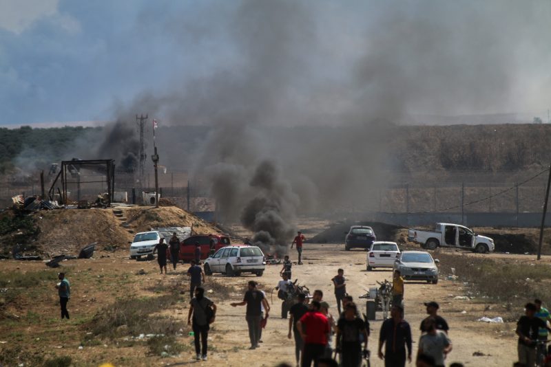 GAZA CITY, GAZA - OCTOBER 7: A bicycle was targeted and two young Palestinian militants were killed near the border fence between the Gaza Strip and Israel on October 7, 2023 in Gaza City, Gaza. The Palestinian militant group Hamas launched a missile attack on Israel today, with fighters simultaneously crossing the border from Gaza. Israel has declared a state of war. (Photo By Ahmad Hasaballah/Getty Images)