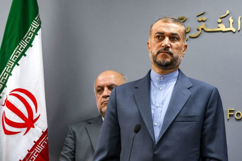 Iran's Foreign Minister Hossein Amir-Abdollahian looks on during a joint press conference with his Lebanese counterpart in Beirut on October 13, 2023. The United States must rein in Israel to avert a regional spillover of the war with Hamas, Iran's top diplomat said in Beirut on October 13, adding Tehran was seeking to safeguard Lebanon's security. He spoke as Hamas and Israel traded heavy fire for a seventh day, after hundreds of Hamas gunmen stormed across the border from Gaza into Israel on October 7 and killed 1,200 people. (Photo by ANWAR AMRO / AFP) (Photo by ANWAR AMRO/AFP via Getty Images)