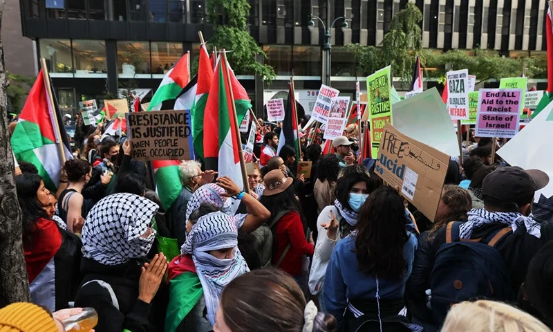 NEW YORK, NEW YORK - OCTOBER 09: Pro-Palestinian demonstrators gather in support of the Palestinian people during a rally for Gaza at the Consulate General of Israel on October 09, 2023 in New York City. On October 7, the Palestinian militant group Hamas launched a surprise attack on Israel from Gaza by land, sea, and air, killing over 700 people and wounding more than 2000. Israeli soldiers and civilians have also been kidnapped by Hamas and taken into Gaza. The attack prompted a declaration of war by Israeli Prime Minister Benjamin Netanyahu, and ongoing retaliatory strikes by Israel on Gaza killing hundreds. (Photo by Michael M. Santiago/Getty Images)