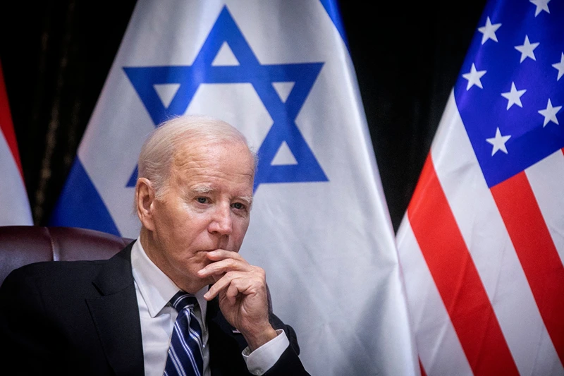 TOPSHOT-ISRAEL-US-PALESTINIAN-CONFLICT
TOPSHOT - US President Joe Biden joins Israel's Prime Minister for the start of the Israeli war cabinet meeting, in Tel Aviv on October 18, 2023, amid the ongoing battles between Israel and the Palestinian group Hamas. US President Joe Biden landed in Tel Aviv on October 18, 2023 as Middle East anger flared after hundreds were killed when a rocket struck a hospital in war-torn Gaza, with Israel and the Palestinians quick to trade blame. (Photo by Miriam Alster / POOL / AFP) (Photo by MIRIAM ALSTER/POOL/AFP via Getty Images)