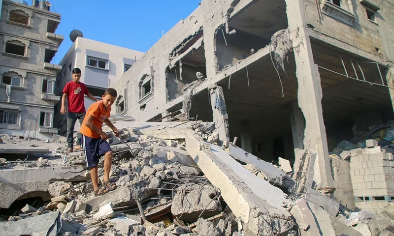 Gaza Comes Under Sustained Bombardment By Israel After Hamas Attacks GAZA CITY, GAZA - OCTOBER 14: Palestinian citizens inspect damage to their homes caused by Israeli airstrikes on October 14, 2023 in Gaza City, Gaza. Many Gazan citizens have fled to the south following warnings from the Israeli government to do so. Israel has sealed off Gaza and launched sustained retaliatory air strikes, which have killed at least 1,400 people with more than 300,000 displaced, after a large-scale attack by Hamas. On October 7, the Palestinian militant group Hamas launched a surprise attack on Israel from Gaza by land, sea, and air, killing over 1,300 people and wounding around 2,800. Israeli soldiers and civilians have also been taken hostage by Hamas and moved into Gaza. The attack prompted a declaration of war by Israeli Prime Minister Benjamin Netanyahu and the announcement of an emergency wartime government. (Photo by Ahmad Hasaballah/Getty Images)
