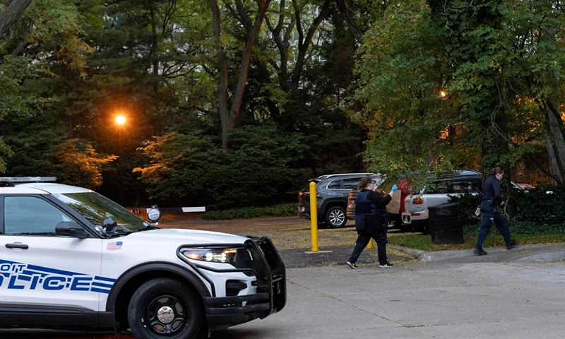 US-CRIME-HOMICIDE-RELIGION-TENSIONS Detroit police officers work near the scene where Isaac Agree Downtown Synagogue president, Samantha Woll, was found dead in Detroit, October 21, 2023. The politically active leader of a Detroit synagogue was found dead with stab wounds outside her home on October 21, and police said the motive of the slaying was not known. The killing came at a moment of escalating tensions in Jewish and Muslim communities across the United States over the Israel-Hamas conflict that has taken thousands of lives this month. The victim of Saturday's murder, Samantha Woll, 40, presided over the Isaac Agree Downtown Synagogue in Detroit. (Photo by Sarah RICE / AFP) (Photo by SARAH RICE/AFP via Getty Images)