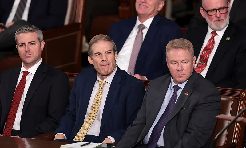 WASHINGTON, DC - OCTOBER 17: U.S. Rep. Jim Jordan (R-OH) (C) listens in front of former Speaker of the House Kevin McCarthy (R-CA) as the House of Representatives votes on a Speaker of the House at the U.S. Capitol Building on October 17, 2023 in Washington, DC. The House has been without an elected leader since Rep. Kevin McCarthy (R-CA) was ousted from the speakership on October 4 in a move led by a small group of conservative members of his own party. (Photo by Win McNamee/Getty Images)