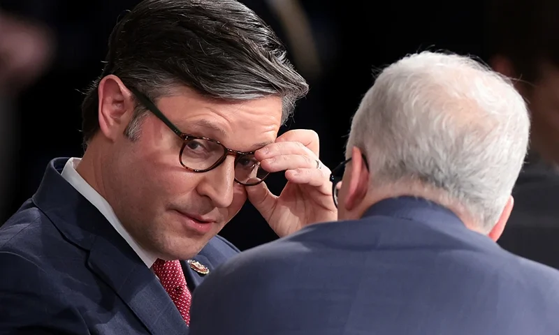 WASHINGTON, DC - OCTOBER 25: U.S. Rep. Mike Johnson (R-LA) (L) talks to Speaker Pro Tempore Rep. Patrick McHenry (R-NC) as the House of Representatives holds an election for a new Speaker of the House at the U.S. Capitol on October 25, 2023 in Washington, DC. After a contentious nominating period that has seen four candidates over a three-week period, the House GOP conference selected Johnson as their most recent nominee to succeed former Speaker Kevin McCarthy (R-CA), who was ousted on October 4 in a move led by a small group of conservative members of his own party. (Photo by Win McNamee/Getty Images)