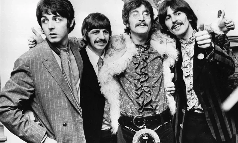 19th May 1967: The Beatles celebrate the completion of their new album, 'Sgt Pepper's Lonely Hearts Club Band', at a press conference held at the west London home of their manager Brian Epstein. The LP is released on June 1st. (Photo by John Pratt/Keystone/Getty Images)