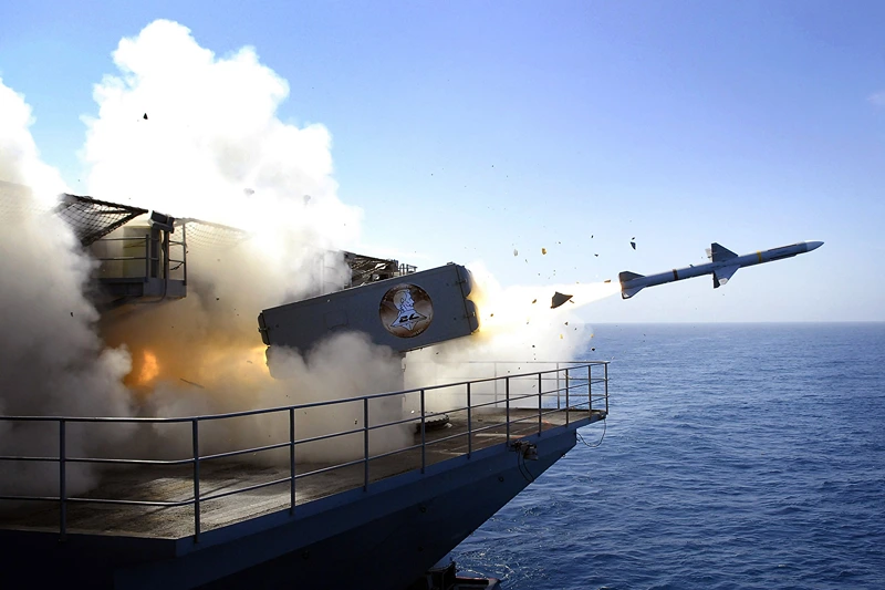 AT SEA - AUGUST 13: In this handout photo provided by the U.S. Navy, a RIM-7P NATO Sea Sparrow Missile launches the Nimitz-class aircraft carrier USS Abraham Lincoln (CVN 72) during a stream raid shoot exercise on August 13, 2007 in the Pacific Ocean, At Sea. Lincoln's self-defense systems fired four Sea Sparrow missiles, engaging and destroying two BQM-74E turbojet-powered drone aircraft and a High-Speed Maneuvering Surface Threat (HSMST) remote controlled Rigid Hulled Inflatable Boat (RHIB) during the event. Lincoln and embarked Carrier Air Wing (CVW) 2 are underway off the coast of Southern California conducting Tailored Ship's Training Availability (TSTA). (Photo by Jordon R. Beesley/U.S. Navy via Getty Images)
