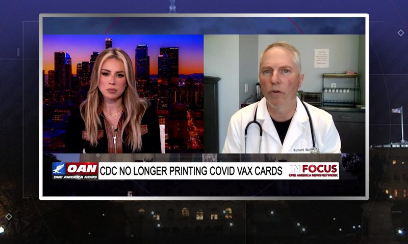 Video still from In Focus on One America News Network showing a split screen of the host on the left side, and on the right side is the guest, Dr. Richard Bartlett.