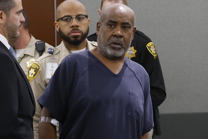5 of 9 | Duane "Keffe D" Davis is led into the courtroom at the Regional Justice Center on Wednesday, Oct. 4, 2023, in Las Vegas . Davis has been charged in the 1996 fatal drive-by shooting of rapper Tupac Shakur. (Bizuayehu Tesfaye/Las Vegas Review-Journal via AP, Pool)