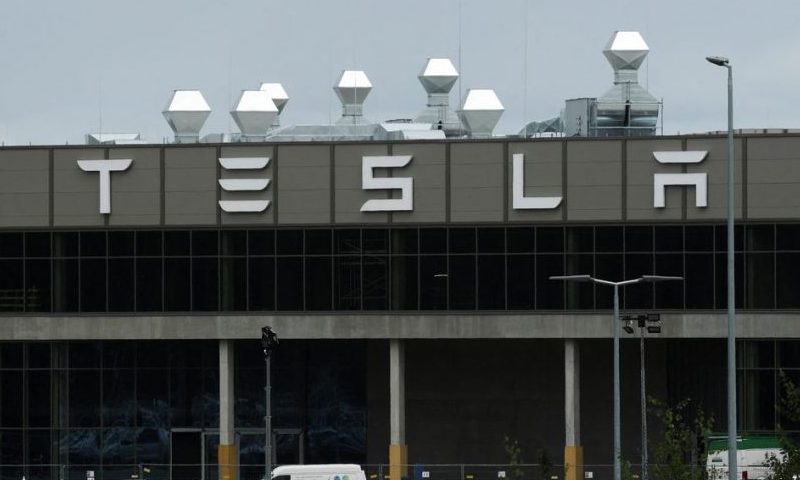 A general view shows the Tesla logo on the Gigafactory in Gruenheide near Berlin, Germany, August 30, 2022. REUTERS/Annegret Hilse/File Photo