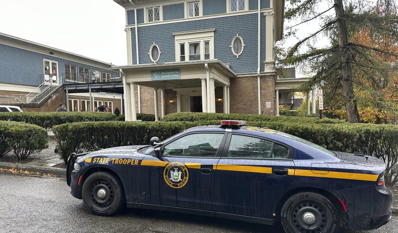 A New York State Police Department cruiser is parked in front of Cornell University's Center for Jewish Living, in Ithaca, NY, Monday, Oct 30, 2023. Threatening statements about Jews on an internet discussion board have unnerved students at Cornell University and prompted officials to send police to guard a Jewish center and kosher dining hall. (AP Photo/David Bauder)