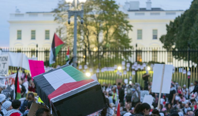 Anti-war activists carrying a mock coffin protest outside of the White House during a pro-Palestinian demonstration asking for a cease fire in Gaza in Washington, Saturday, Nov. 4, 2023. (AP Photo/Jose Luis Magana)