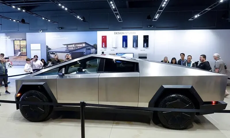 Tesla's new Cybertruck is shown on display at a Tesla store in San Diego, California, U.S., November 20, 2023. REUTERS/Mike Blake/File Photo