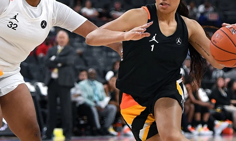LAS VEGAS, NEVADA - APRIL 20: Breanna Beal #1 is guarded by Kaelynn Satterfield #32 during the Jordan Brand Classic girls high school all-star basketball game at T-Mobile Arena on April 20, 2019 in Las Vegas, Nevada. (Photo by Ethan Miller/Getty Images)