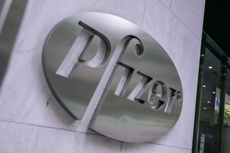 NEW YORK, NY - JULY 22: Pfizer Inc. signage is seen on July 22, 2020 in New York City. Pfizer and German biotechnology firm BioNTech have agreed to supply the U.S. government with 100 million doses of coronavirus vaccine under a $1.95 billion deal. (Photo by Jeenah Moon/Getty Images)