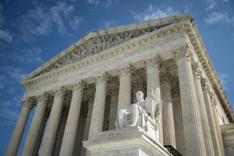 WASHINGTON, DC - SEPTEMBER 28: The Guardian or Authority of Law, created by sculptor James Earle Fraser, rests on the side of the U.S. Supreme Court on September 28, 2020 in Washington, DC. This week Seventh U.S. Circuit Court Judge Amy Coney Barrett, U.S. President Donald Trump's nominee to the Supreme Court, will begin meeting with Senators as she seeks to be confirmed before the presidential election. (Photo by Al Drago/Getty Images)