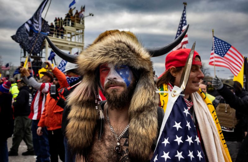 WASHINGTON, DC - JANUARY 6: Jacob Anthony Angeli Chansley, known as the QAnon Shaman, is seen at the Capital riots. On January 9, Chansley was arrested on federal charges of "knowingly entering or remaining in any restricted building or grounds without lawful authority, and with violent entry and disorderly conduct on Capitol grounds"Trump supporters clashed with police and security forces as people try to storm the US Capitol on January 6, 2021 in Washington, DC. Demonstrators breeched security and entered the Capitol as Congress debated the 2020 presidential election Electoral Vote Certification. (photo by Brent Stirton/Getty Images)