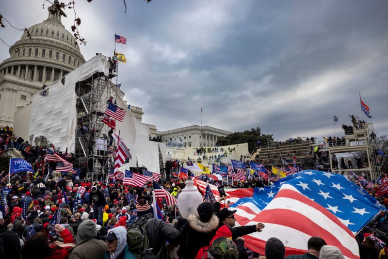 WASHINGTON, DC - JANUARY 6: Trump supporters clash with police and security forces as people try to storm the US Capitol on January 6, 2021 in Washington, DC. Demonstrators breeched security and entered the Capitol as Congress debated the 2020 presidential election Electoral Vote Certification. (photo by Brent Stirton/Getty Images)