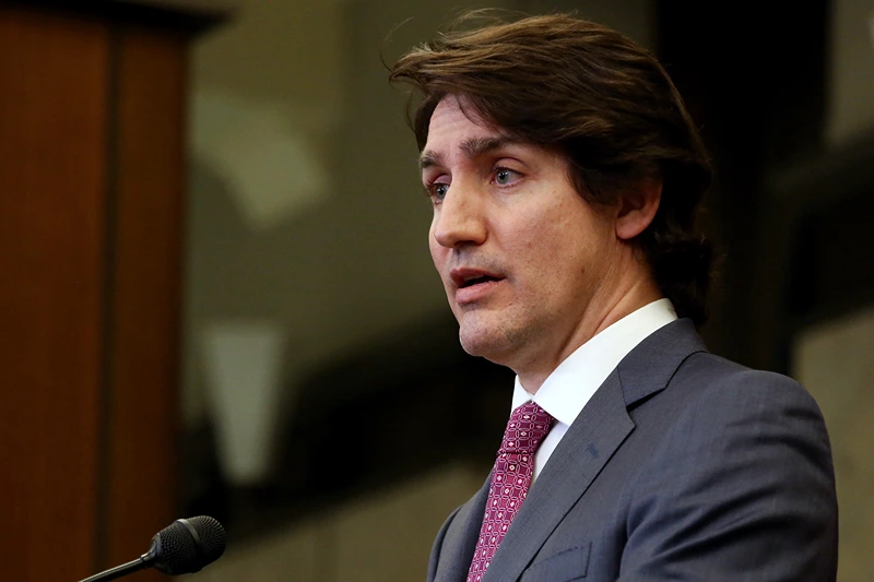 CANADA-HEALTH-VIRUS-PROTEST-TRUDEAU
Canada's Prime Minister Justin Trudeau comments on the on going truckers mandate protest during a news conference on Parliament Hill in Ottawa, Canada on February 14, 2022. - Canadian Prime Minister Justin Trudeau on February 14, 2022 invoked rarely-used emergency powers to bring an end to trucker-led protests against Covid health rules, after police arrested 11 people with a "cache of firearms" blocking a border crossing with the United States. (Photo by Dave Chan / AFP) (Photo by DAVE CHAN/AFP via Getty Images)