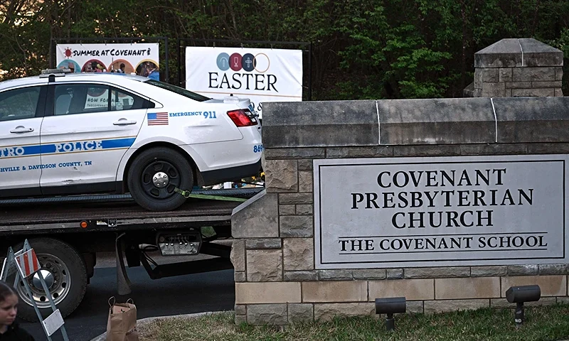 Police cars damaged during a shooting are removed from the Covenant School campus, in Nashville, Tennessee, March 28, 2023. - A heavily armed former student killed three young children and three staff in what appeared to be a carefully planned attack at a private elementary school in Nashville on Monday, before being shot dead by police. Chief of Police John Drake named the suspect as Audrey Hale, 28, who the officer later said identified as transgender. (Photo by Brendan SMIALOWSKI / AFP) (Photo by BRENDAN SMIALOWSKI/AFP via Getty Images)