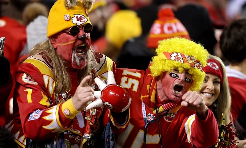 KANSAS CITY, MISSOURI - JANUARY 23: Kansas City Chiefs fans cheer during the AFC Divisional Playoff game between the Buffalo Bills and the Kansas City Chiefs at Arrowhead Stadium on January 23, 2022 in Kansas City, Missouri. (Photo by Jamie Squire/Getty Images)