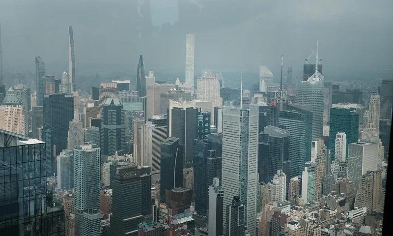 NEW YORK, NEW YORK - JULY 19: A hazy Manhattan skyline greets visitors to an overlook in midtown Manhattan on July 19, 2023 in New York City. An air quality alert remained in effect in New York City and parts of New Jersey due to the continued burning of wildfires in Canada. New York City has experienced some of its worst air quality days in years as a result of the fires which scientists believe are partly the result of a warming planet.