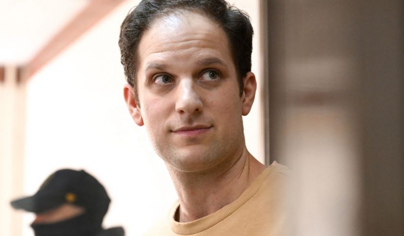 US journalist Evan Gershkovich, arrested on espionage charges, stands inside a defendants' cage before a hearing to consider an appeal on his extended pre-trial detention at the Moscow City Court in Moscow on September 19, 2023. Gershkovich was detained in March during a reporting trip to the Urals and accused of spying -- charges that he, the US government and his employer, the Wall Street Journal, vehemently deny. In August his pre-trial detention was extended by three months. (Photo by NATALIA KOLESNIKOVA / AFP) (Photo by NATALIA KOLESNIKOVA/AFP via Getty Images)