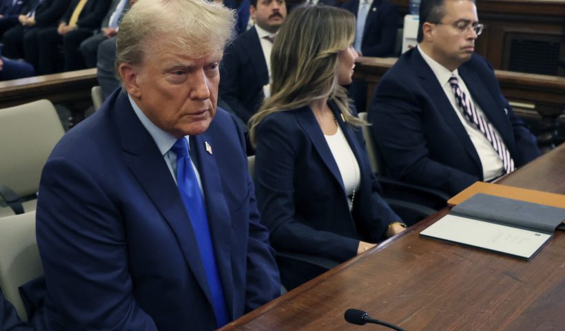 NEW YORK, NEW YORK - OCTOBER 02: Former U.S. President Donald Trump (L) appears in the courtroom with his lawyers for the start of his civil fraud trial at New York State Supreme Court on October 02, 2023 in New York City. Former President Trump may be forced to sell off his properties after Justice Arthur Engoron canceled his business certificates and ruled that he committed fraud for years while building his real estate empire after being sued by Attorney General Letitia James, who is seeking $250 million in damages. The trial will determine how much he and his companies will be penalized for the fraud. (Photo by Brendan McDermid-Pool/Getty Images)