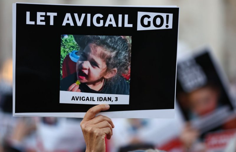 LONDON, ENGLAND - OCTOBER 22: A person holds a poster during a 'Bring Them Home' solidarity rally calling for the release of hostages held in Gaza by Hama on October 22, 2023 in London, England. The Israeli government says 210 hostages were taken by Hamas from communities in southern Israel during the Palestinian militant group's surprise attack on October 7th. The hostages, which include Israelis as well as foreign nationals, are being held captive in the Gaza Strip. Only two have been released so far. (Photo by Peter Nicholls/Getty Images)