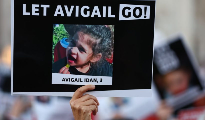 LONDON, ENGLAND - OCTOBER 22: A person holds a poster during a 'Bring Them Home' solidarity rally calling for the release of hostages held in Gaza by Hama on October 22, 2023 in London, England. The Israeli government says 210 hostages were taken by Hamas from communities in southern Israel during the Palestinian militant group's surprise attack on October 7th. The hostages, which include Israelis as well as foreign nationals, are being held captive in the Gaza Strip. Only two have been released so far. (Photo by Peter Nicholls/Getty Images)