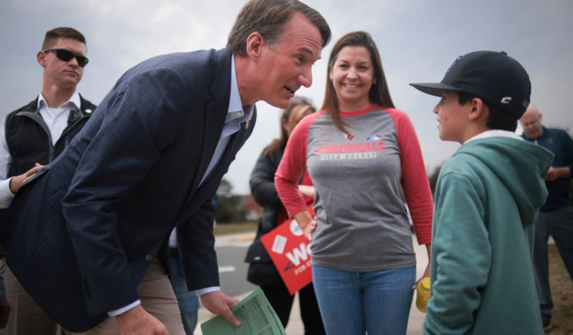 BRISTOW, VIRGINIA - NOVEMBER 07: Virginia Governor Glenn Youngkin greets voters and their children while campaigning at Piney Branch Elementary School November 7, 2023 in Bristow, Virginia. With control of Virginia’s General Assembly at stake, results of the day’s voting could potentially impact the commonwealth’s abortion policies as well as the national political future of Youngkin. (Photo by Win McNamee/Getty Images)