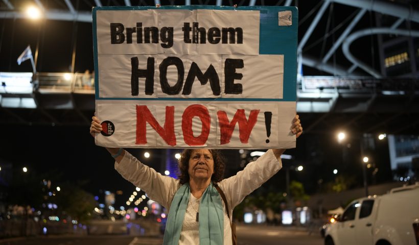 TEL AVIV, ISRAEL - NOVEMBER 21: People demonstrate prior any hostage announcements outside the Kirya defense complex as the political cabinet hold a meeting on November 21, 2023 in Tel Aviv, Israel. Families and supporters of hostages held by Hamas in Gaza gathered near The Kirya defense complex this evening as the Israeli cabinet convened regarding a proposed deal with Hamas for the release of some hostages. The full terms of such a deal were not clear, but both the Israeli prime minister and Hamas leader reported progress. (Photo by Christopher Furlong/Getty Images)