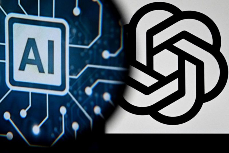 A photo taken on November 23, 2023 shows the logo of the ChatGPT application developed by US artificial intelligence research organization OpenAI on a laptop screen (R) and the letters AI on a smartphone screen in Frankfurt am Main, western Germany. Sam Altman's shock return as chief executive of OpenAI late on November 22 -- days after being sacked -- caps a chaotic period that highlighted deep tensions at the heart of the Artificial Intelligence community. The board that fired Altman from his role as CEO of the ChatGPT creator has been almost entirely replaced following a rebellion by employees, cementing his position at the helm of the firm. (Photo by Kirill KUDRYAVTSEV / AFP) (Photo by KIRILL KUDRYAVTSEV/AFP via Getty Images)