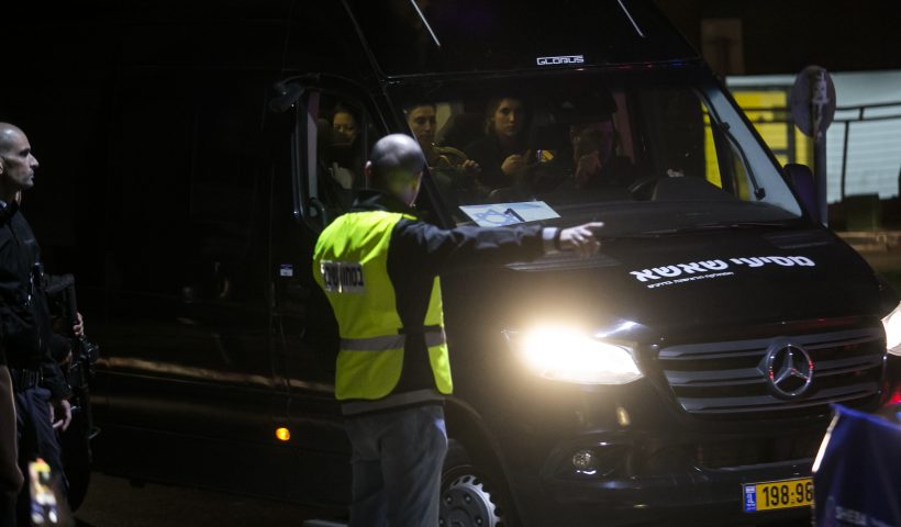 RAMAT GAN, ISRAEL - NOVEMBER 26: A van carrying hostages released from the Gaza Strip as part of a deal between Israel and Hamas arrives at Sheba Medical Center on November 26, 2023 in Ramat Gan, Israel. A total of 50 hostages currently held by Hamas are to be released during a four-day truce with Israel, the first such pause in fighting since Oct. 7, when Hamas launched its surprise attack and Israeli responded with a vast military offensive to destroy the militant group that governs Gaza. Under the deal, 150 Palestinian prisoners are also to be released from Israel, and more humanitarian aid will be admitted at the Gaza-Egypt border crossing. (Photo by Amir Levy/Getty Images)