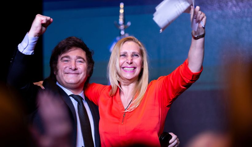 BUENOS AIRES, ARGENTINA - NOVEMBER 19: Newly elected President of Argentina Javier Milei of La Libertad Avanza celebrates with his sister Karina Milei after the polls closed in the presidential runoff on November 19, 2023 in Buenos Aires, Argentina. According to official results, Javier Milei of La Libertad Avanza reached 55,69% of the votes and Sergio Massa of Union Por La Patria 44,30%, with 99,25 of the votes counted. The presidential election runoff to succeed Alberto Fernandez comes as Argentinians have been hard hit by an annual 142,7% inflation. (Photo by Tomas Cuesta/Getty Images)